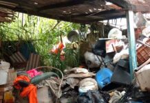 Lixo é retirado da casa de acumulador pela Vigilância Sanitária em Varginha Lixo